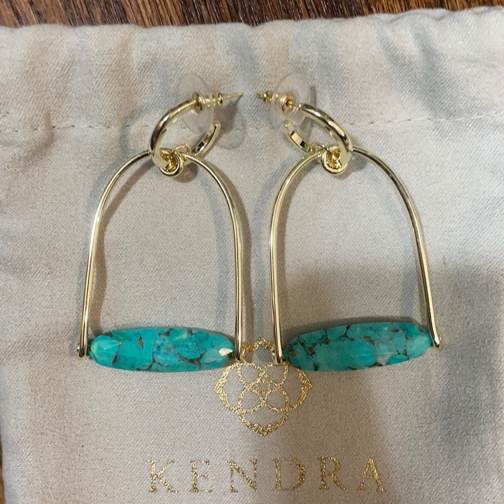 Kendra Scott turquoise earrings.